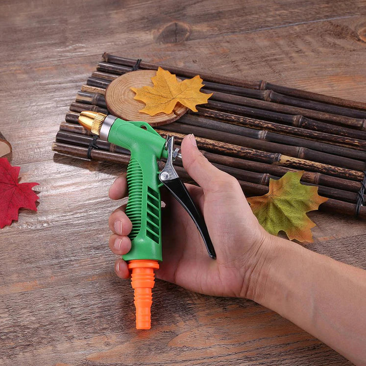 SPRAY GUN FOR WATERING AND SPRINKLING PURPOSES OVER PLANTS AND TREES IN PARKS AND TYPES OF GARDEN PLACES ETC